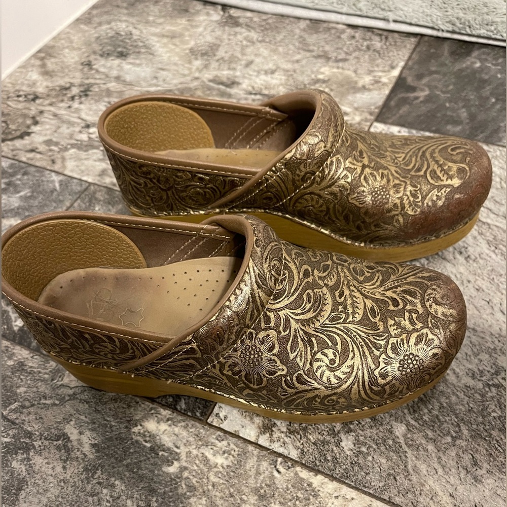 Dansko antique tooled clogs